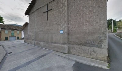 Iglesia de Nuestra Señora del Amparo de Tuilla / Tiuya